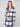Elegant black and white plaid coat featuring a button-front closure, perfect for adding sophistication to any outfit by Charlie B.