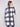 Black and white plaid coat made from luxurious boucle knit fabric, highlighted by its sleek tailored collar for elegance by Charlie B.