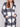 Chic plaid design in black and white on this boucle knit coat adds a modern touch to any outfit while ensuring comfort all day long. By Charlie B.