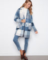Cozy coat with a button closure, perfect for chilly days, featuring a stylish design by Charlie B.
