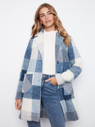 This coat showcases patch pockets, adding both style and functionality to your outfit by Charlie B.