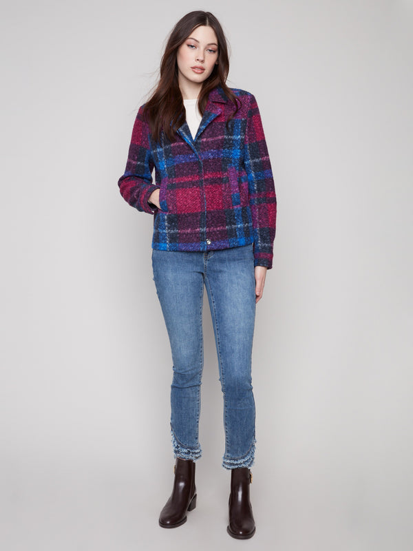 This coat showcases a notch lapel collar in a plaid boucle knit with navy and magenta hues, perfect for stylish layering by Charlie B.