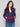 Vibrant plaid boucle knit short coat with practical welt pockets, combining fashion and functionality effortlessly by Charlie B.