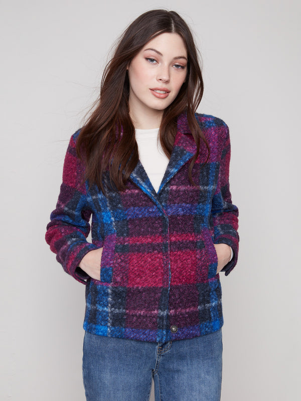 Vibrant plaid boucle knit short coat with practical welt pockets, combining fashion and functionality effortlessly by Charlie B.