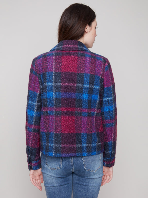 Experience the cozy texture of bouclé knit fabric in this plaid short coat, designed in striking navy and magenta tones by Charlie B.