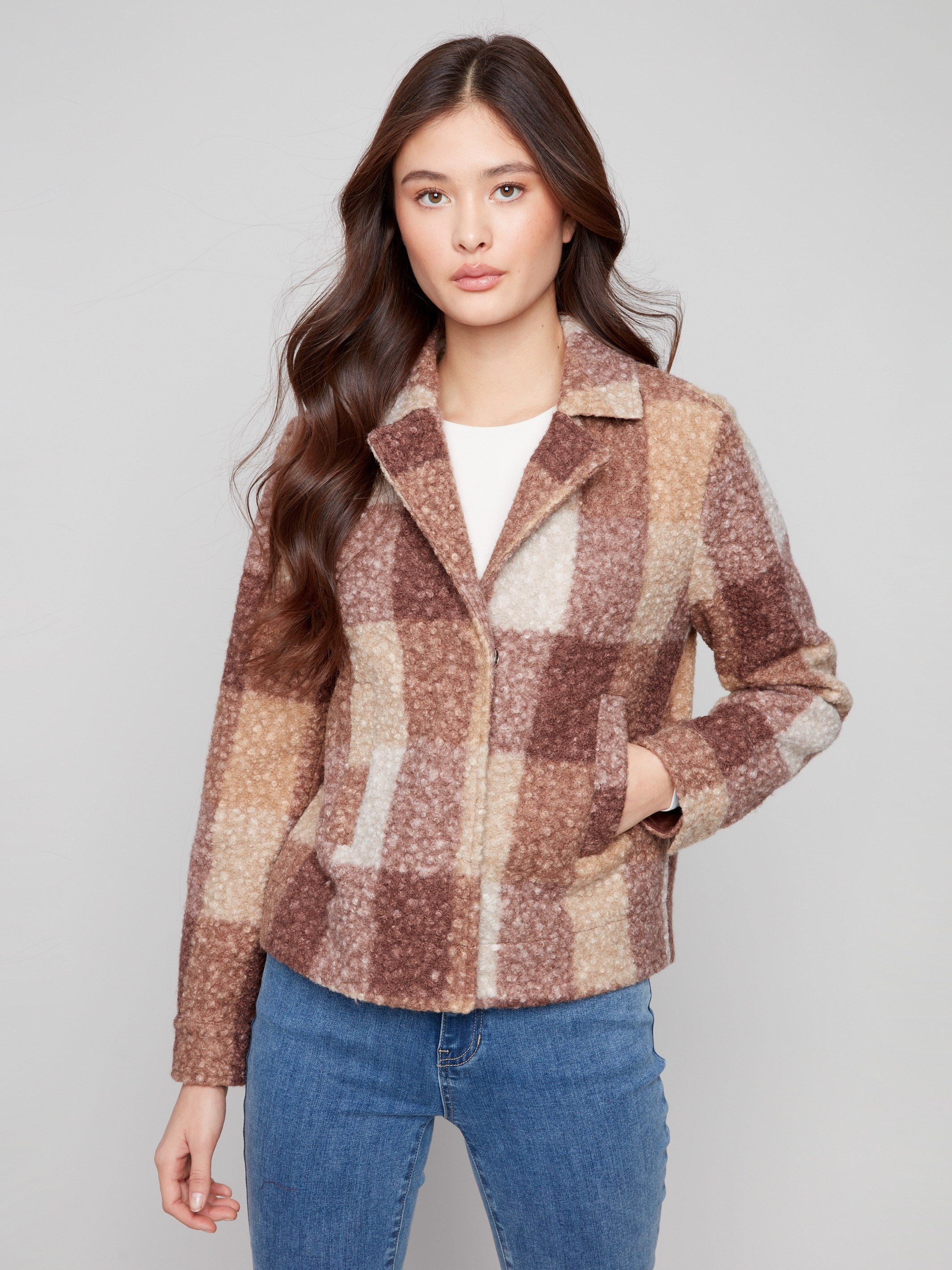 Mocha plaid short coat featuring hidden snap closure and welt pockets for a sleek look by Charlie B.