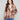 Mocha plaid short coat featuring hidden snap closure and welt pockets for a sleek look by Charlie B.