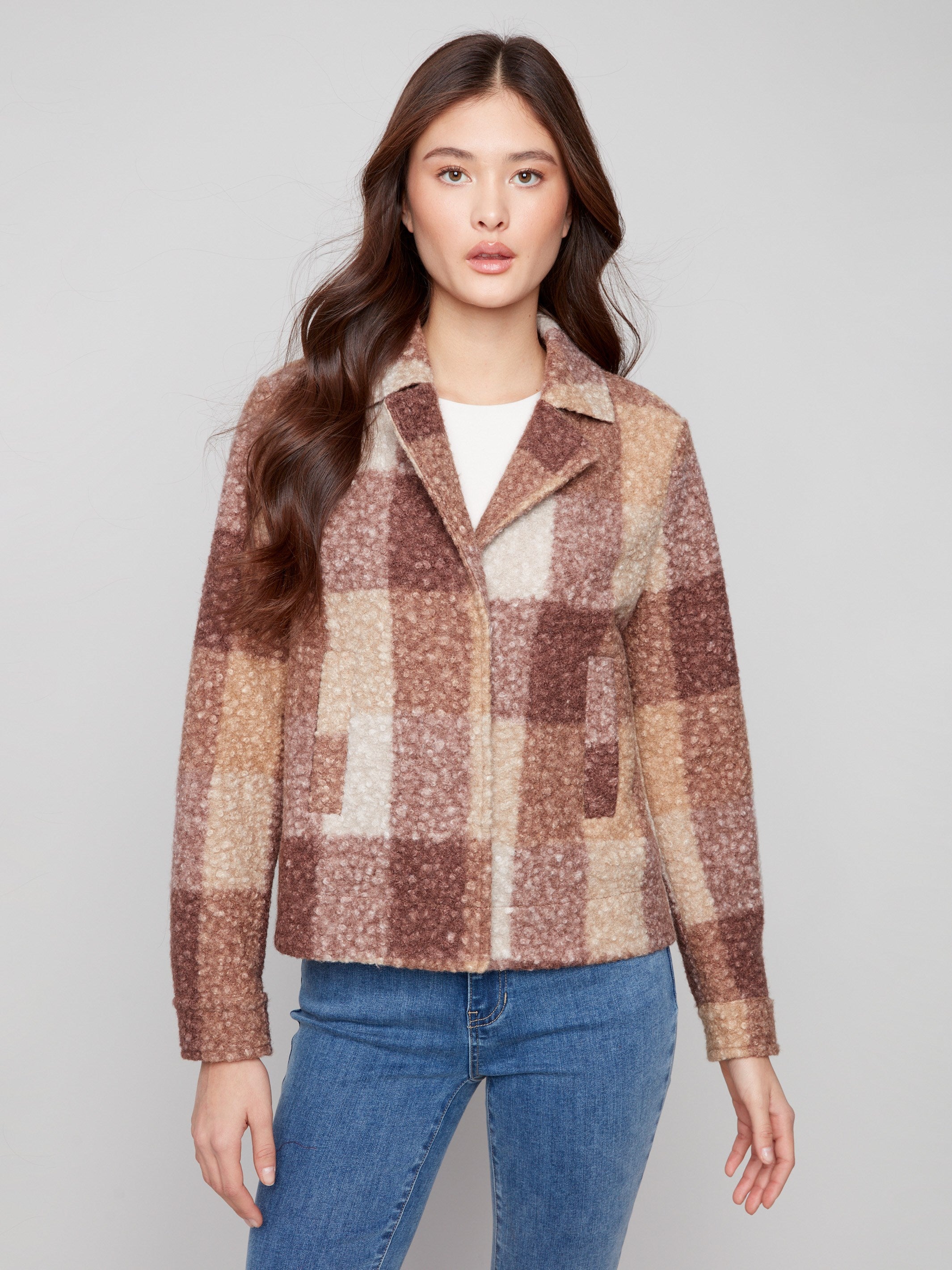 Stylish mocha plaid coat with welt pockets, perfect for adding flair to any outfit by Charlie B.