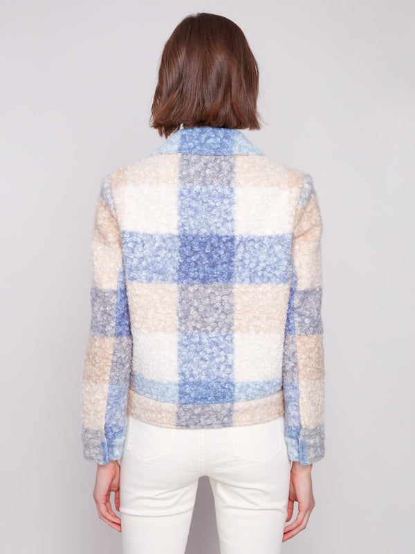 Stylish plaid boucle knit short coat in calming blue and beige colors, crafted with attention to detail for timeless elegance by Charlie B.