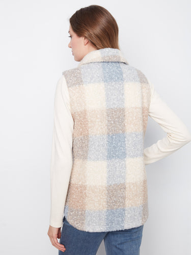 The cozy design of this plaid vest includes a soft texture and versatile colors perfect for fall layering. By Charlie B.