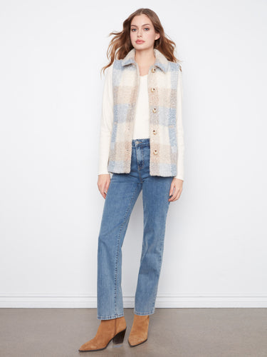 This versatile plaid vest is designed with comfort in mind, offering an easy fit and effortless style all season long. By Charlie B.