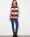 Plaid vest featuring a button-front closure for versatile styling. The cozy texture adds warmth and charm to any outfit. By Charlie B.
