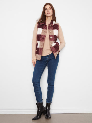 Button-front closure on this chic plaid vest makes it easy to layer over various outfits while maintaining a polished look. By Charlie B.
