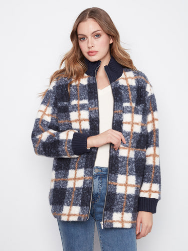 Trendy plaid jacket featuring side slash pockets, perfect for keeping essentials close at hand. Made by Charlie B.