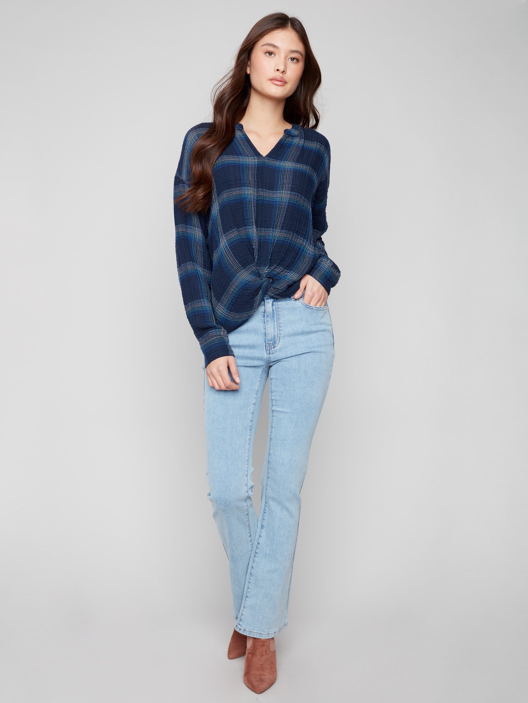 Elegant blue plaid blouse crafted from soft double gauze fabric, offering comfort and style by Charlie B.