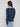 Stylish blue plaid blouse showcasing a unique front knot detail for added flair by Charlie B.
