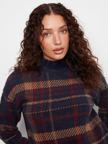 Enjoy the comfort of this plush knit sweater with its stylish drop shoulder design. By Charlie B.