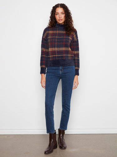 The long sleeves on this plaid sweater add warmth and style to your fall wardrobe. By Charlie B.