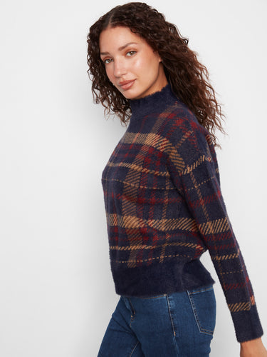 A plush knit fabric enhances the cozy feel of this trendy plaid sweater. By Charlie B.
