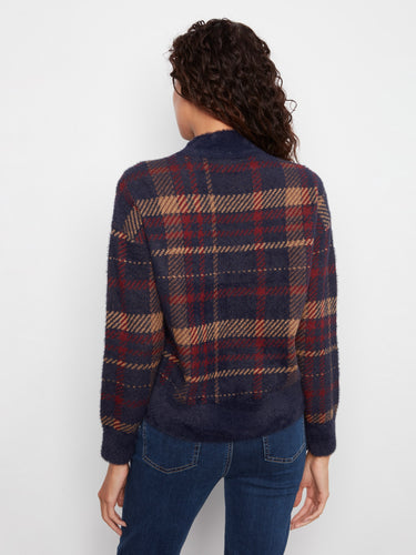 The mock neck adds an elegant touch to this cozy plaid-patterned sweater. By Charlie B.