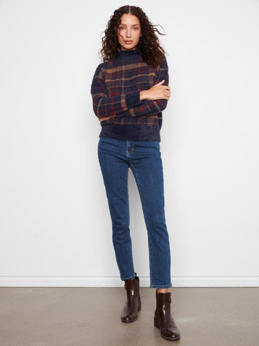 Long sleeves make this plaid knit top ideal for layering during cooler seasons. By Charlie B.