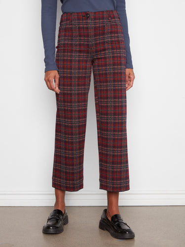These cropped length plaid pants offer a chic and modern twist, ideal for any casual or semi-formal occasion. By Charlie B.