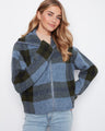 Plaid jacket featuring a classic Johnny collar, perfect for casual outings. By Charlie B.
