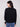 Elegant black sweater showcasing long sleeves with cheerful colorful boucle flower details for added charm by Charlie B.