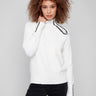 Ecru plush sweater featuring raglan sleeves and intricate heart cross-stitch, perfect for cozy days by Charlie B.