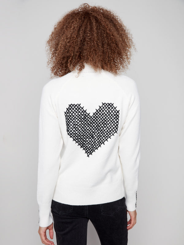 Sweater with a standout heart cross-stitch on the back and soft plush texture, ideal for style by Charlie B.