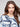 Stylish V-neck sweater in blue swirl pattern, perfect for any casual outing by Charlie B.