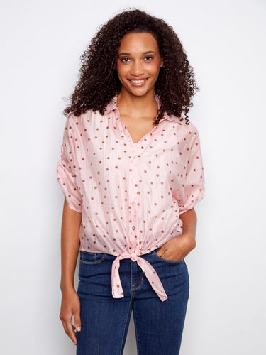 Trendy semi-sheer pink blouse with playful polka dots and short dolman sleeves for added style by Charlie B.