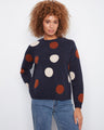 Navy sweater with a chic crew neckline, oversized polka dots, and speckled texture. Perfect for casual outings by Charlie B.