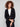 Black blazer with a stylish notch lapel collar, paired elegantly with gold buttons for a chic look by Charlie B.