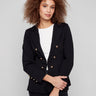 Black blazer with a stylish notch lapel collar, paired elegantly with gold buttons for a chic look by Charlie B.