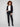 Stylish black blazer highlighted by its refined hook-and-eye front closure and eye-catching details by Charlie B.