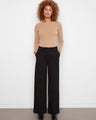 These pants feature a flattering wide-leg design, perfect for any occasion. Elevate your wardrobe with this essential piece by Charlie B.