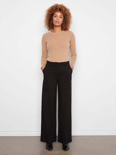 These pants feature a flattering wide-leg design, perfect for any occasion. Elevate your wardrobe with this essential piece by Charlie B.
