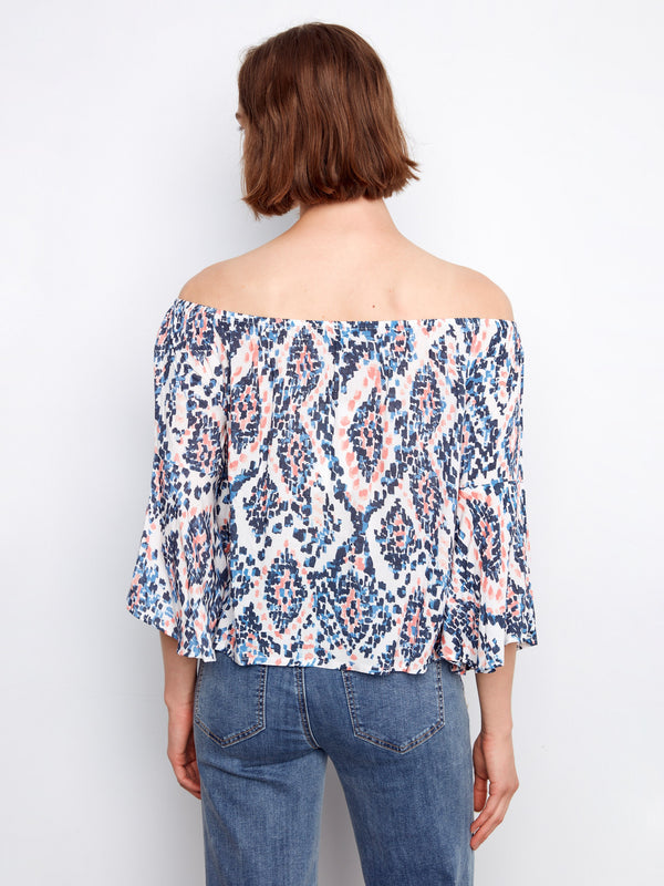 Chic blouse with an intricate abstract pattern, perfect for a casual day out, by Charlie B.