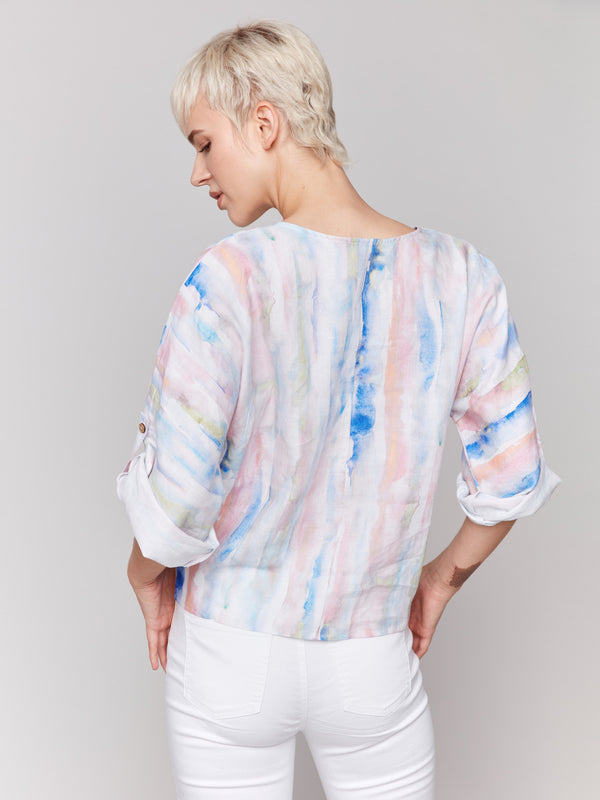 Fashionable V-neck top featuring an abstract design by Charlie B.