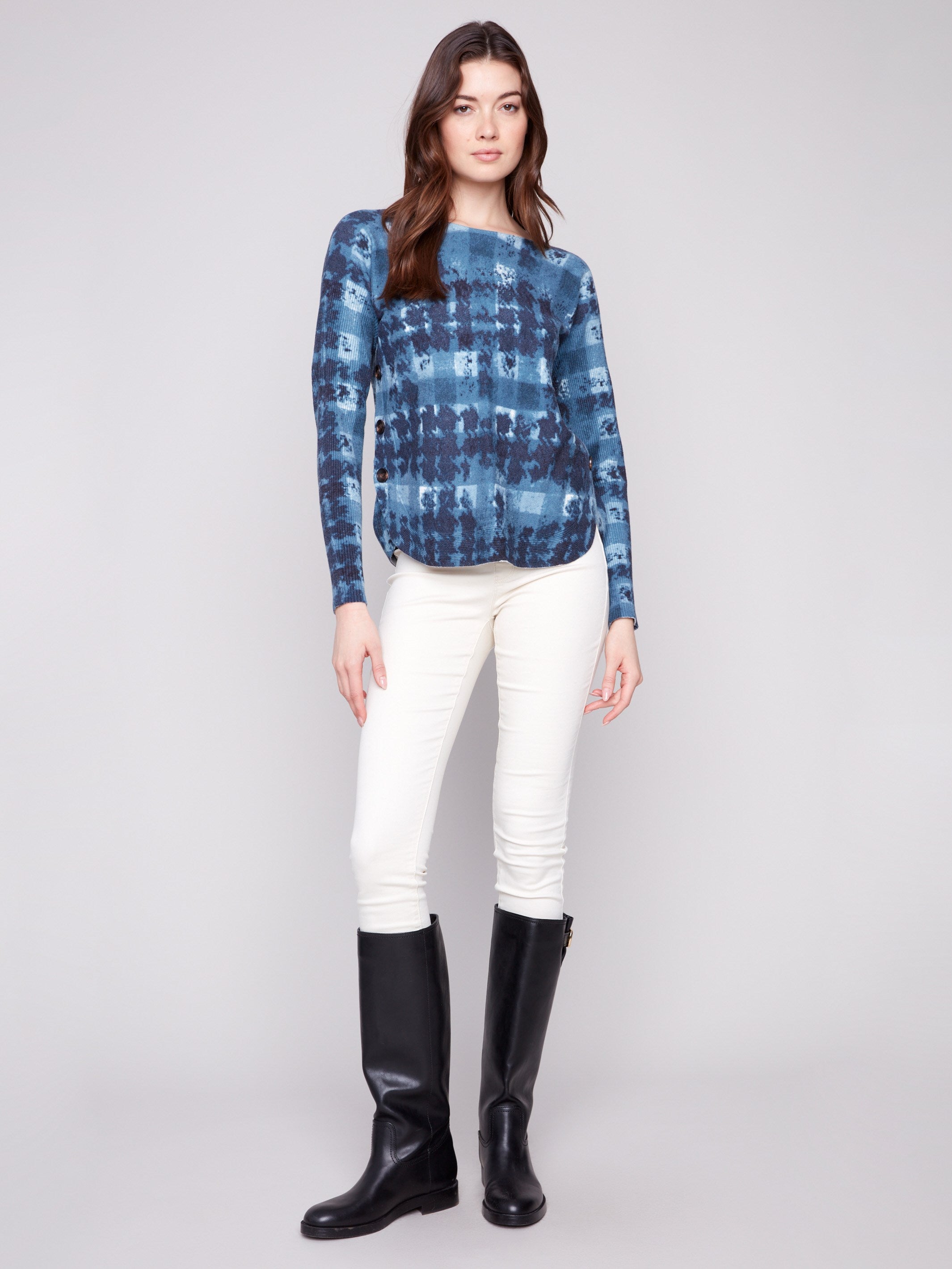 Shadow print sweater featuring side button details and a stylish rounded hem by Charlie B.
