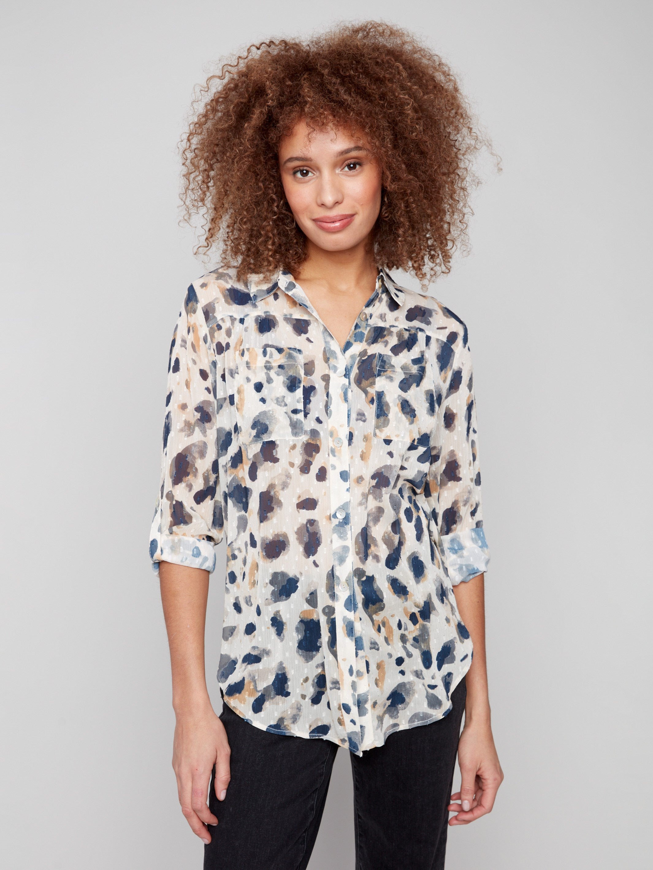 Semi-sheer animal print blouse with adjustable roll-up sleeves by Charlie B.