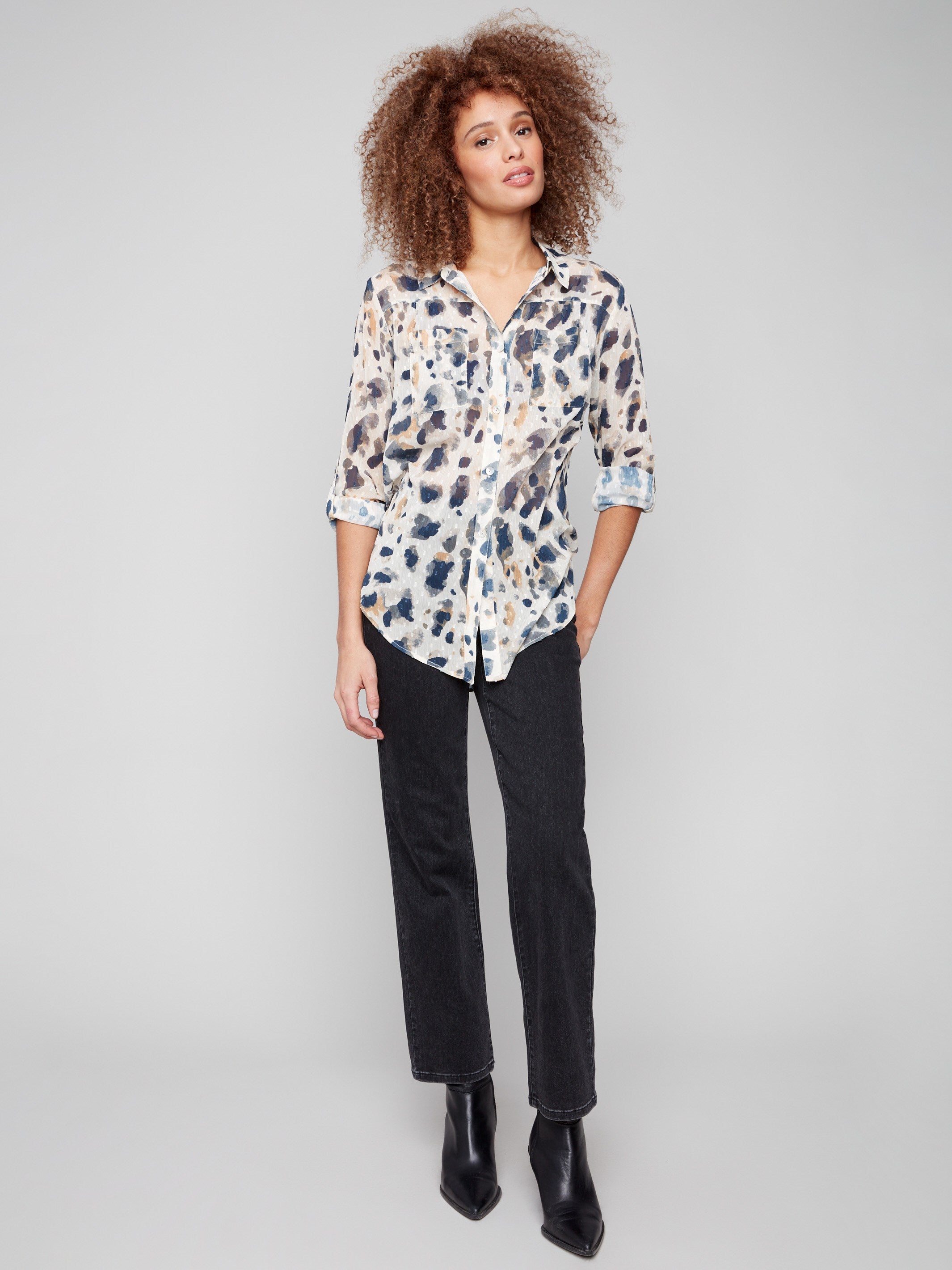 Animal pattern blouse with chest pocket detail for added style by Charlie B.