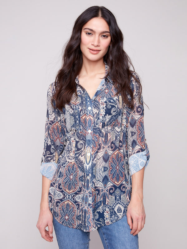 Paisley blouse with adjustable roll-up sleeves and chest pockets, perfect for versatile styling by Charlie B.
