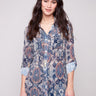 Paisley blouse with adjustable roll-up sleeves and chest pockets, perfect for versatile styling by Charlie B.