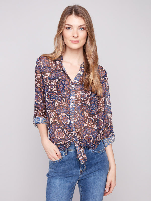 Button-down dobby blouse with a medallion pattern, offering a stylish tie-front option by Charlie B.