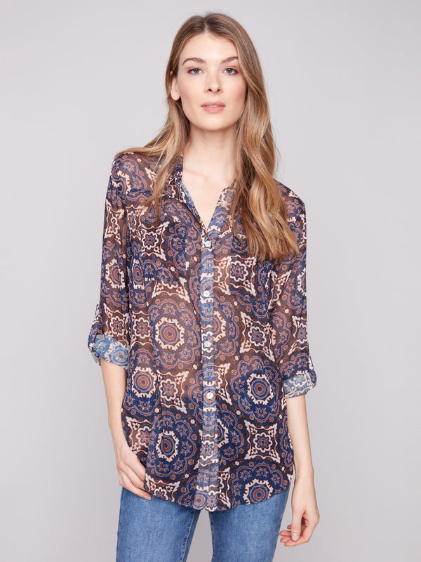 Printed button-up dobby blouse with medallion design, featuring chest pockets and a tie front by Charlie B.