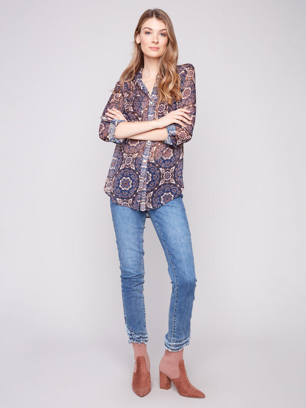Printed button-up dobby blouse with medallion design, featuring chest pockets and a tie front by Charlie B.