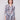Semi-sheer patchwork blouse with chest pockets and adjustable roll-up sleeves, perfect for layering by Charlie B.