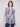 Semi-sheer patchwork blouse with chest pockets and adjustable roll-up sleeves, perfect for layering by Charlie B.